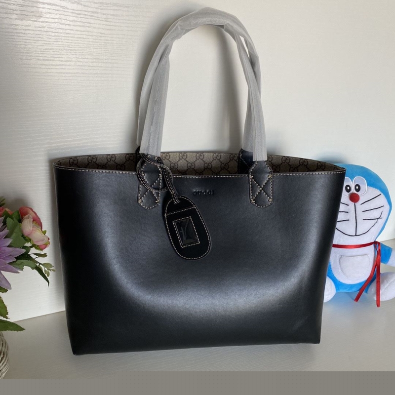 G*u*i shopping bags